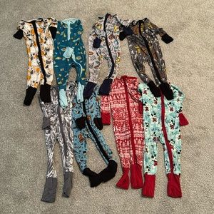 Little Sleepies size 6-12 months play condition.